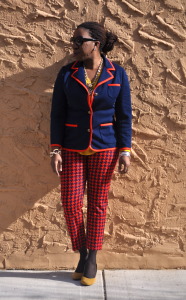 Red and blue houndstooth pants, red and blue blazer, yellow blouse